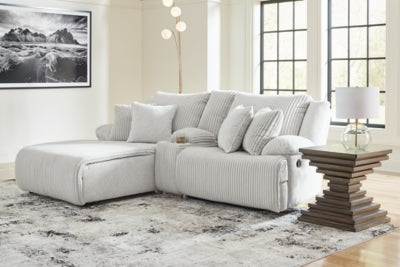 Ashley Furniture Top Tier reclining sectional sofa with chaise, showing plush cushions and reclining features in a modern living room.