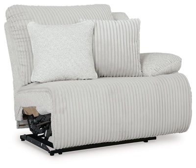 Ashley Furniture Top Tier reclining sectional sofa with chaise, shown from an angled view, featuring plush cushions and a modern design.
