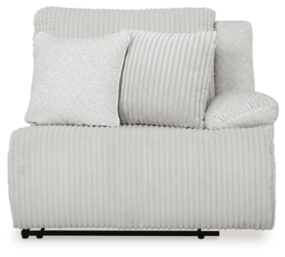 Ashley Furniture Top Tier reclining sectional sofa with chaise, showing plush cushions and reclining features in a modern living room setting.