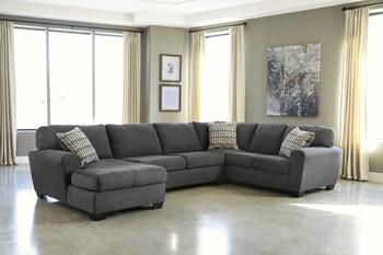 Ashley Furniture Ambee 3-piece sectional with chaise, showing plush fabric cushions and modern design in a spacious living room setting.