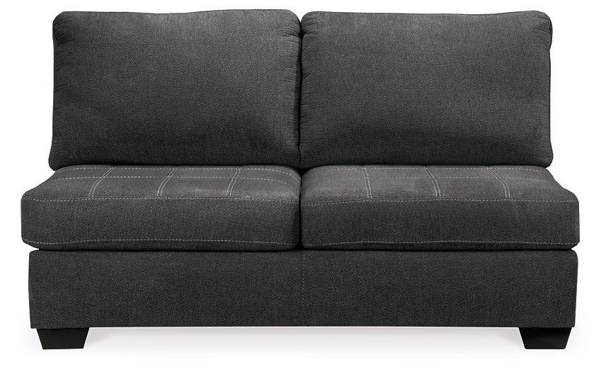 Ashley Furniture Ambee 3-piece sectional with chaise showing plush fabric and modern design in a spacious living room setting.