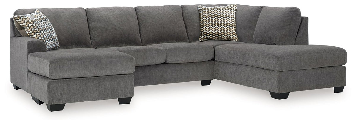 Ashley Furniture Riverfield sectional with chaise, showing a modern fabric sofa with a spacious chaise lounge, angled view.