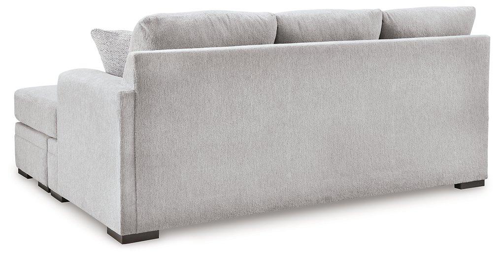 Ashley Furniture Gabyleigh sectional with chaise, featuring plush upholstery and modern design, shown in a spacious living room setting.