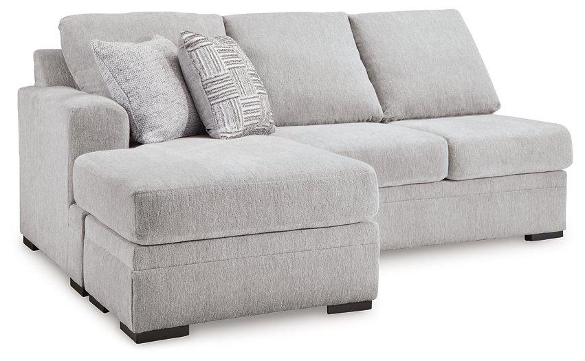 Ashley Furniture Gabyleigh sectional with chaise showing plush fabric upholstery and spacious seating arrangement.