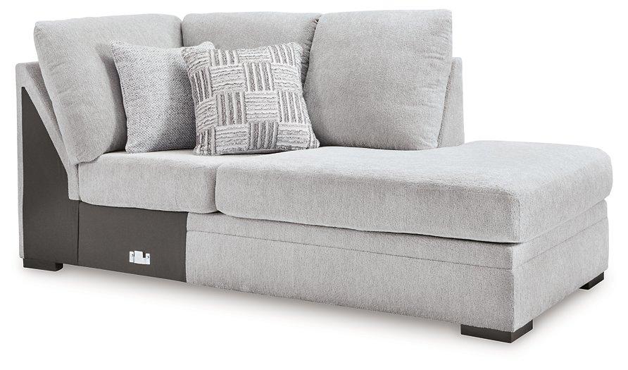 Ashley Furniture Gabyleigh sectional with chaise, featuring plush cushions and modern design in a cozy living room setting.