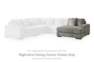 Ashley Furniture Lindyn sectional with chaise, brown fabric sofa featuring plush cushions and a modern design.