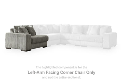 Ashley Furniture Lindyn sectional with chaise, tan fabric, plush cushions, modern design, and wooden legs.