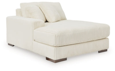Ashley Furniture Lindyn sectional with chaise, showcasing a modern fabric sofa with plush cushions and angled view.
