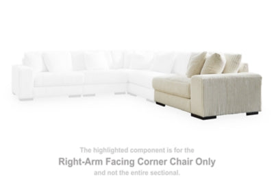 Ashley Furniture Lindyn sectional with chaise, showing plush fabric upholstery and modern design in a stylish living room setting.