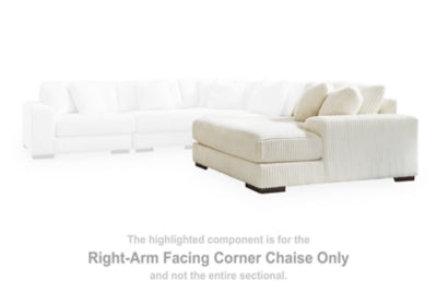 Ashley Furniture Lindyn sectional with chaise, featuring plush fabric, modern design, and spacious seating arrangement.