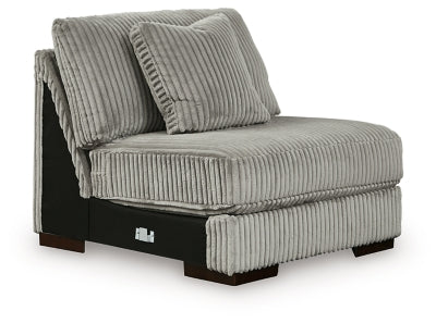 Ashley Furniture Lindyn sectional with chaise, featuring plush cushions and modern design, viewed from an angled perspective.