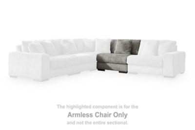 Ashley Furniture Lindyn sectional with chaise, featuring plush upholstery and modern design, shown in a stylish living room setting.