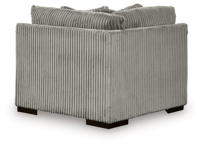 Ashley Furniture Lindyn sectional with chaise, showing plush fabric upholstery and overstuffed back cushions.