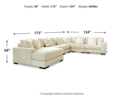 Ashley Furniture Lindyn sectional with chaise, featuring plush fabric, modern design, and spacious seating in a stylish living room setting