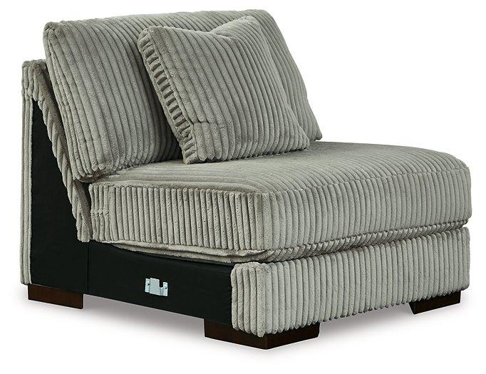 Ashley Furniture Lindyn sectional sofa with plush cushions and modern design, shown in a stylish living room setting.