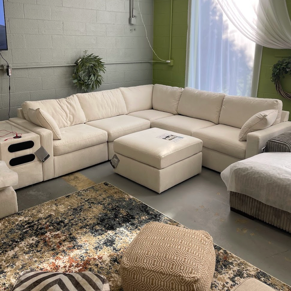 Ashley Furniture Modmax 5-piece corner sectional sofa with granite upholstery, featuring multiple seating areas and plush cushions.