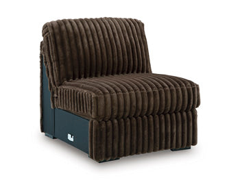 Ashley Furniture Midnight-Madness sectional sofa with dark upholstery, angled view showing plush cushions and modern design.