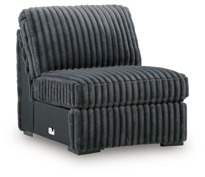 Ashley Furniture Midnight-Madness sectional sofa shown from an angled view, featuring plush cushions and modern design.
