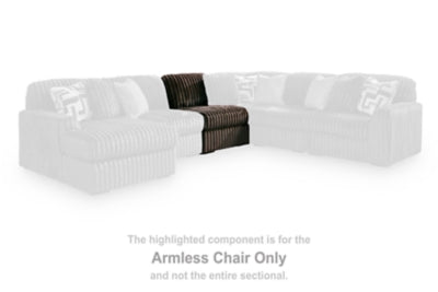 Ashley Furniture Midnight-Madness sectional sofa with plush cushions and modern design in a stylish living room setting.