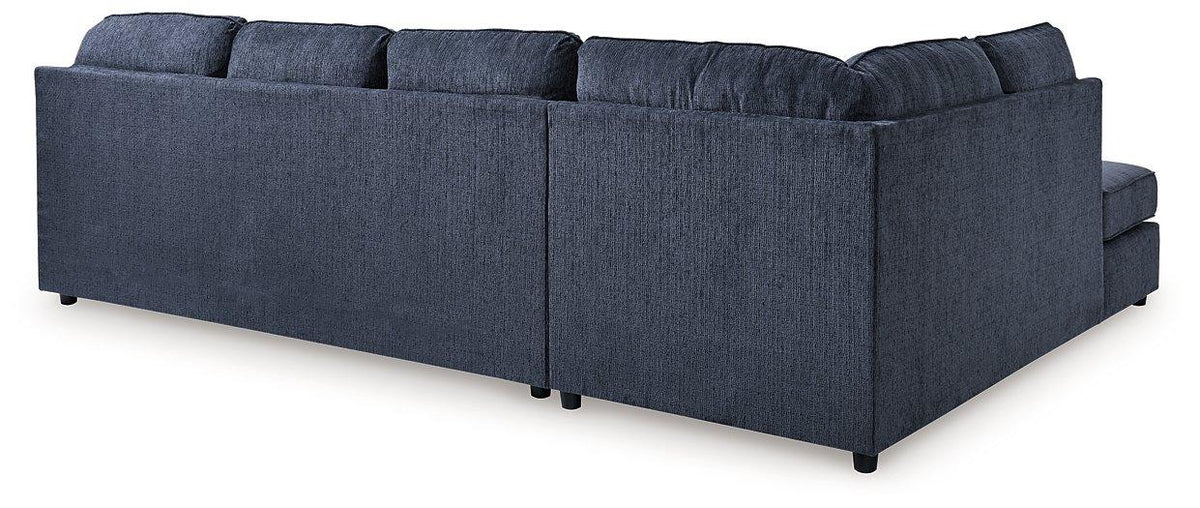 Ashley Furniture Albar Place sectional sofa with plush cushions and modern design in a stylish living room setting.