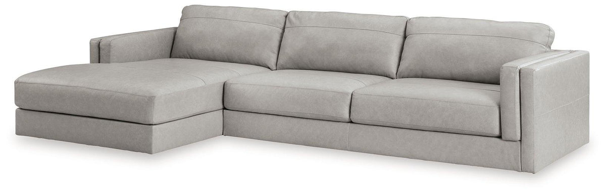 Ashley Furniture Amiata sectional with chaise, featuring plush cushions and modern design, perfect for stylish living room seating.