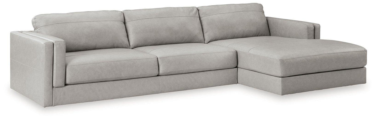Ashley Furniture Amiata sectional with chaise, featuring plush fabric and modern design for comfortable living space.