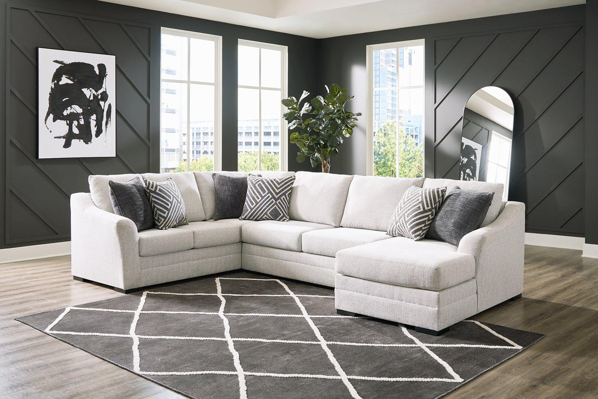 Ashley Furniture Koralynn sectional with chaise, showing plush fabric upholstery and modern design in a spacious living room setting.