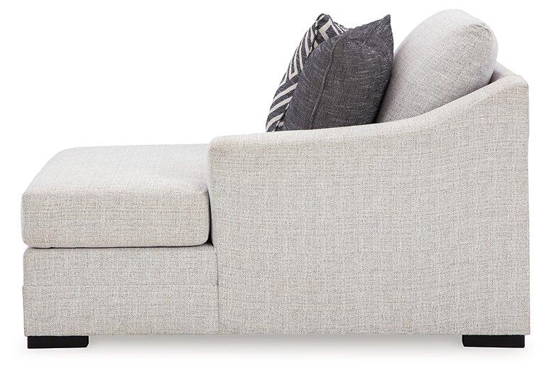 Ashley Furniture Koralynn sectional with chaise, featuring plush upholstery and modern design in a cozy living room setting.