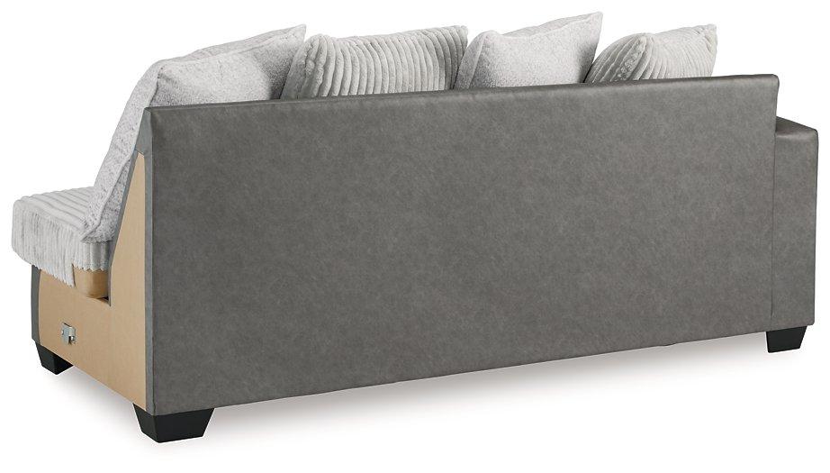 Ashley Furniture Clairette sectional with chaise, showing plush fabric upholstery and modern design for comfortable living space.