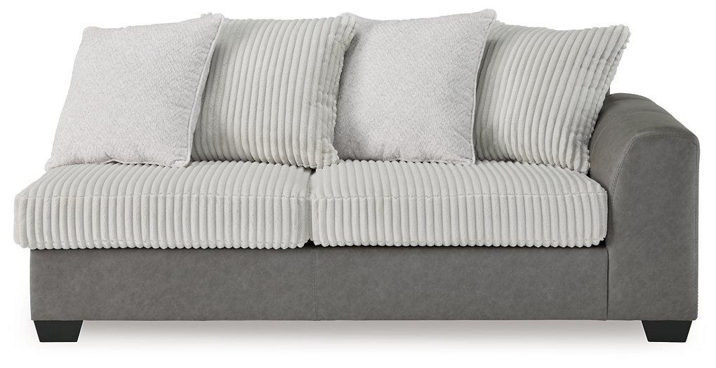 Ashley Furniture Clairette sectional with chaise, light gray fabric, plush cushions, and modern design for living room comfort