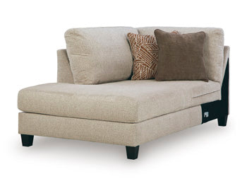 Ashley Furniture Steelwater Retreat sectional with chaise, showing plush fabric and modern design from an angled view.