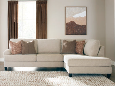 Ashley Furniture Steelwater Retreat sectional with chaise in a modern fabric, featuring plush cushions and a stylish design.