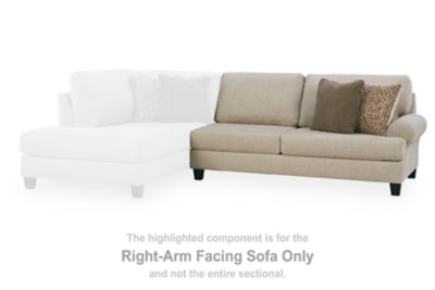 Ashley Furniture Steelwater Retreat sectional with chaise, featuring plush upholstery and modern design, shown in a living room setting.