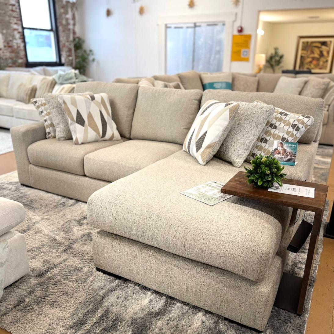 Silverwood sectional sofa with right chaise by Ashley Furniture, featuring plush cushions and modern design.