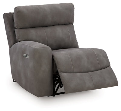 Ashley Furniture Next-Gen DuraPella Power Reclining Sectional shown from an angled open view, featuring plush cushions and modern design.