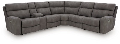 Ashley Furniture Next-Gen DuraPella power reclining sectional with plush cushions and modern design, shown in a spacious living room setting.