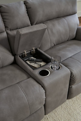 Close-up of the Ashley Furniture Next-Gen DuraPella Power Reclining Sectional showing textured upholstery and reclining mechanism details.