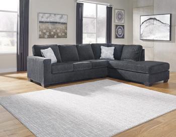 Ashley Furniture Altari sectional with chaise, featuring plush fabric and modern design, shown in a living room setting.