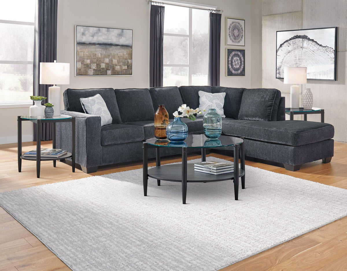 Ashley Furniture Altari sectional with chaise showing a spacious living room seating arrangement with plush cushions and modern design.