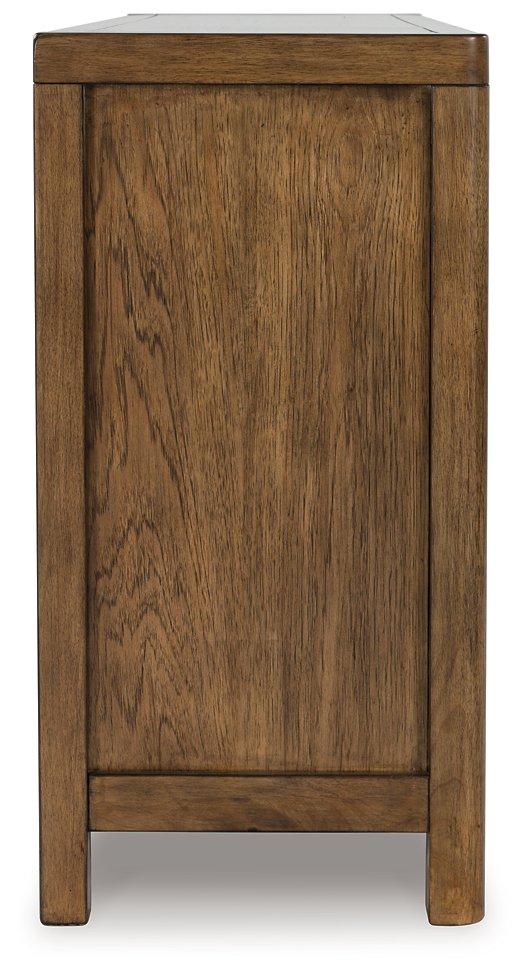 Cabalynn dining server by Ashley Furniture featuring a wooden finish, multiple storage compartments, and elegant design for dining rooms.
