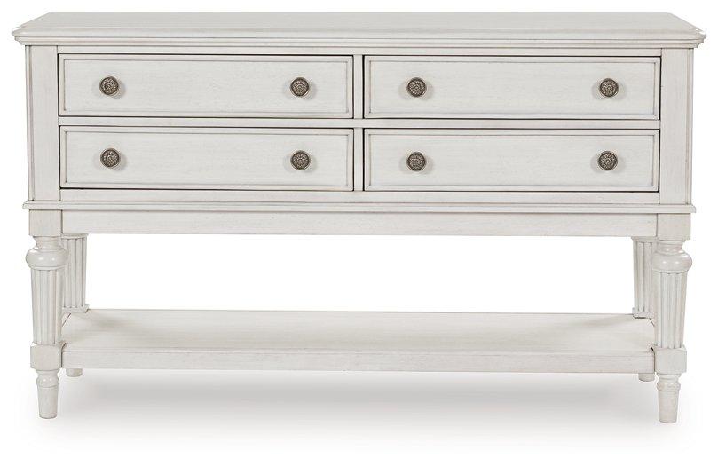 Montelaine dining server by Ashley Furniture featuring a wooden finish and multiple storage drawers and cabinets.