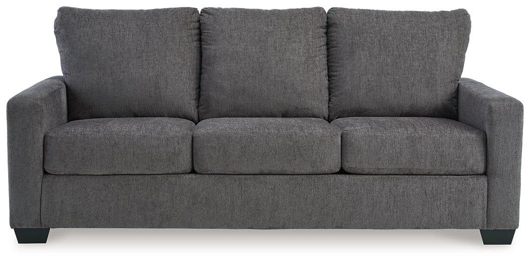 Ashley Furniture Rannis sofa sleeper showing a modern gray sleeper sofa with plush cushions and a pull-out bed feature.