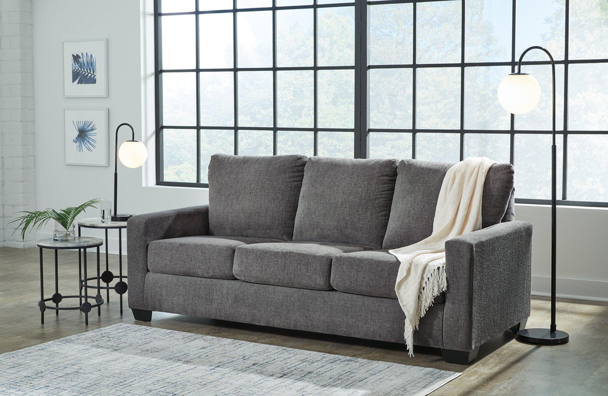 Ashley Furniture Rannis Sofa Sleeper with plush fabric, modern design, and fold-out bed for versatile seating and sleeping space.