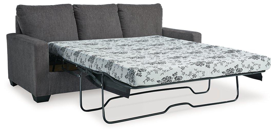 Ashley Furniture Rannis Sofa Sleeper with plush fabric and convertible design, showcasing its modern style and comfortable seating.
