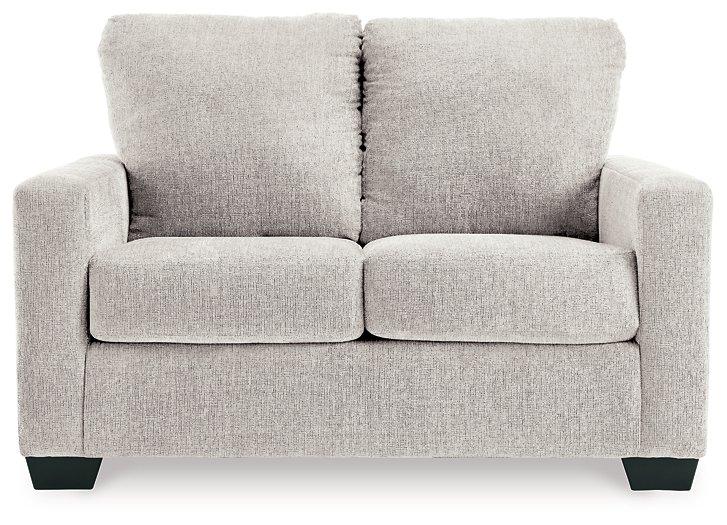 Ashley Furniture Rannis sofa sleeper with plush upholstery, featuring a convertible design and supportive cushions.