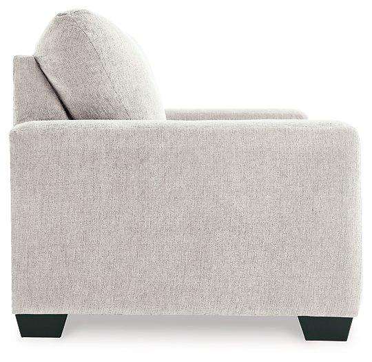 Ashley Furniture Rannis sofa sleeper with plush fabric and convertible design, shown in a stylish living room setting.