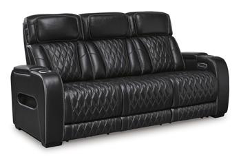 Ashley Boyington Power Reclining Sofa with plush cushions and reclining features, showcasing its modern design and comfortable seating.