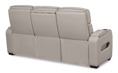 Ashley Furniture Boyington Power Reclining Sofa with plush back cushions and recliner mechanisms, shown from the back in the image.