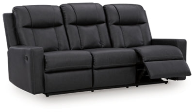 Ashley Furniture Mackmenville reclining sofa, open angle view showing plush cushions and reclining mechanism in a modern living room setting.
