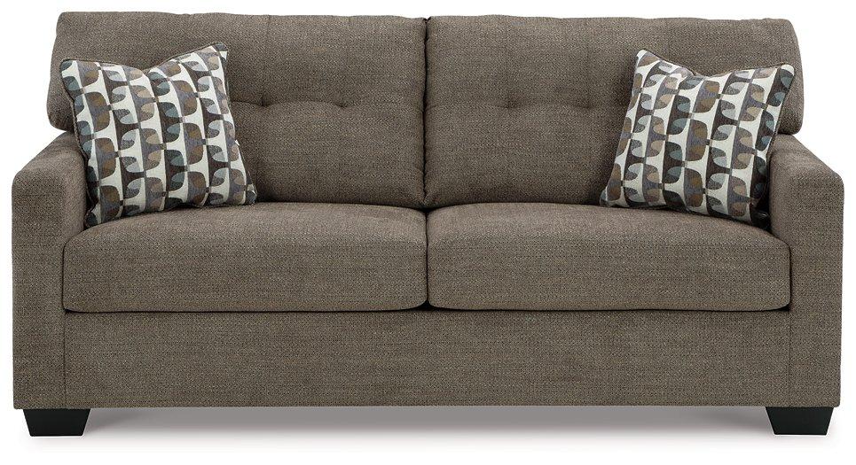 Ashley Furniture Mahoney sofa with plush cushions and modern design, shown in a cozy living room setting.